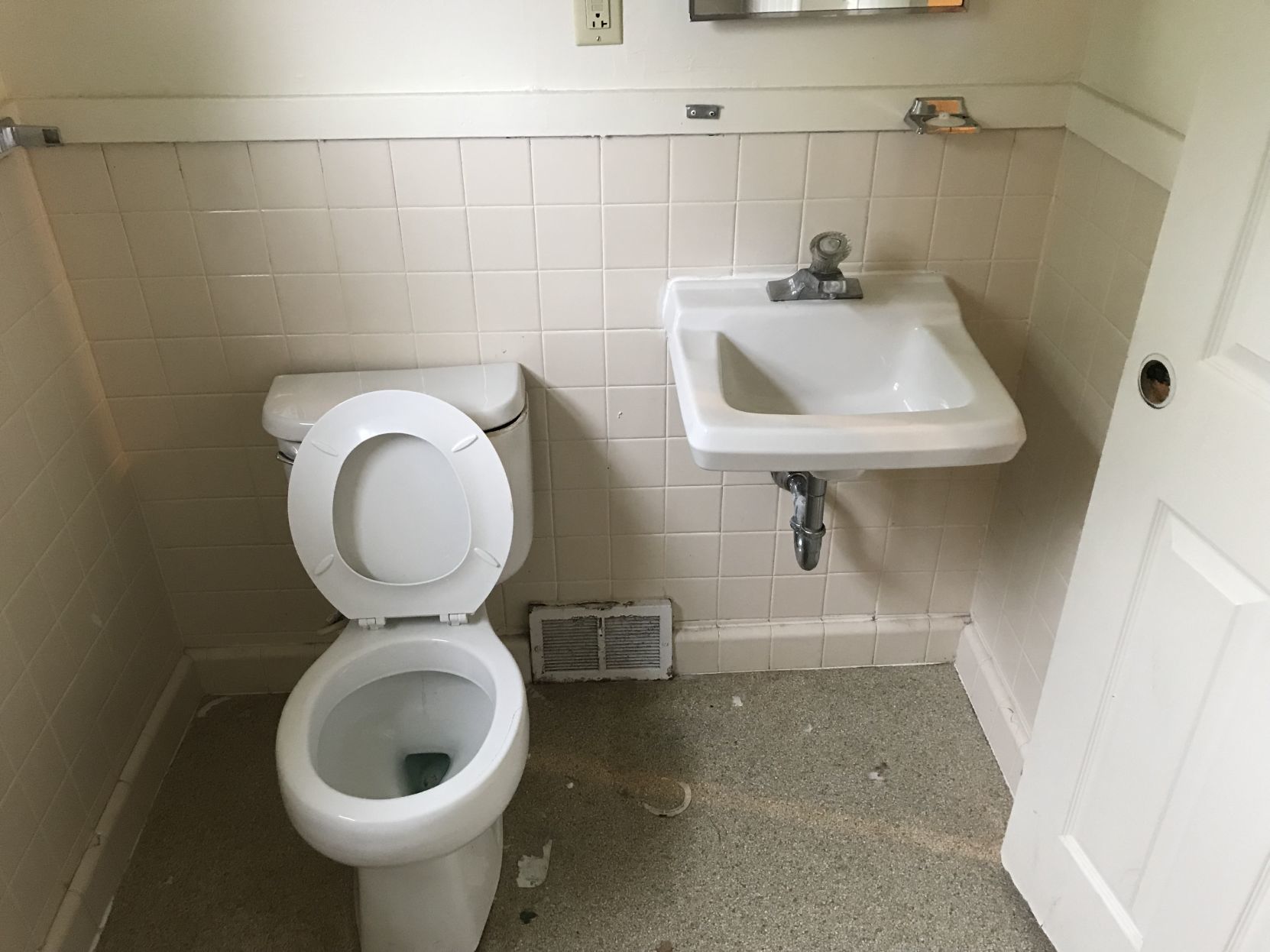Melone Village bathroom, before